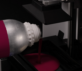 3D printing resins - CURO Cast resin pouring into DENTIQ dental 3D printer